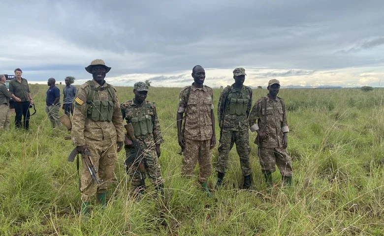 How do national parks in East Africa protect wildlife?